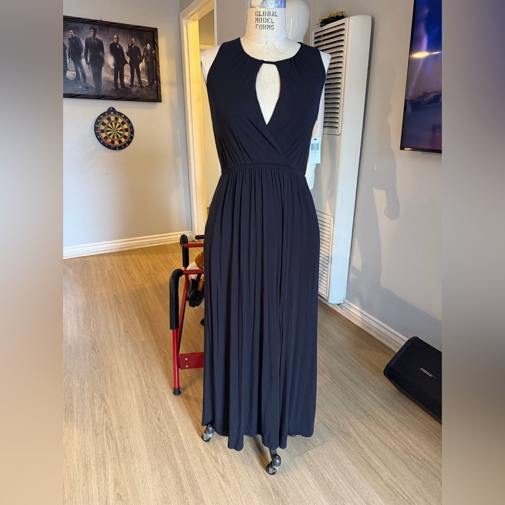 Neiman Marcus Black Maxi Dress featuring a keyhole on chest and low slit size XS